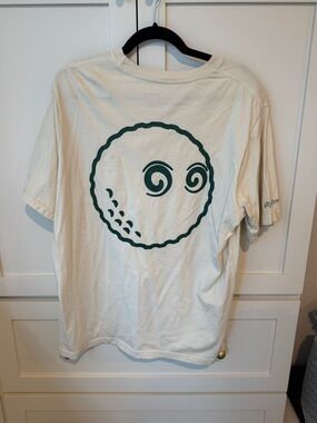 Cream Graphic Tee with Green Golf Ball Design